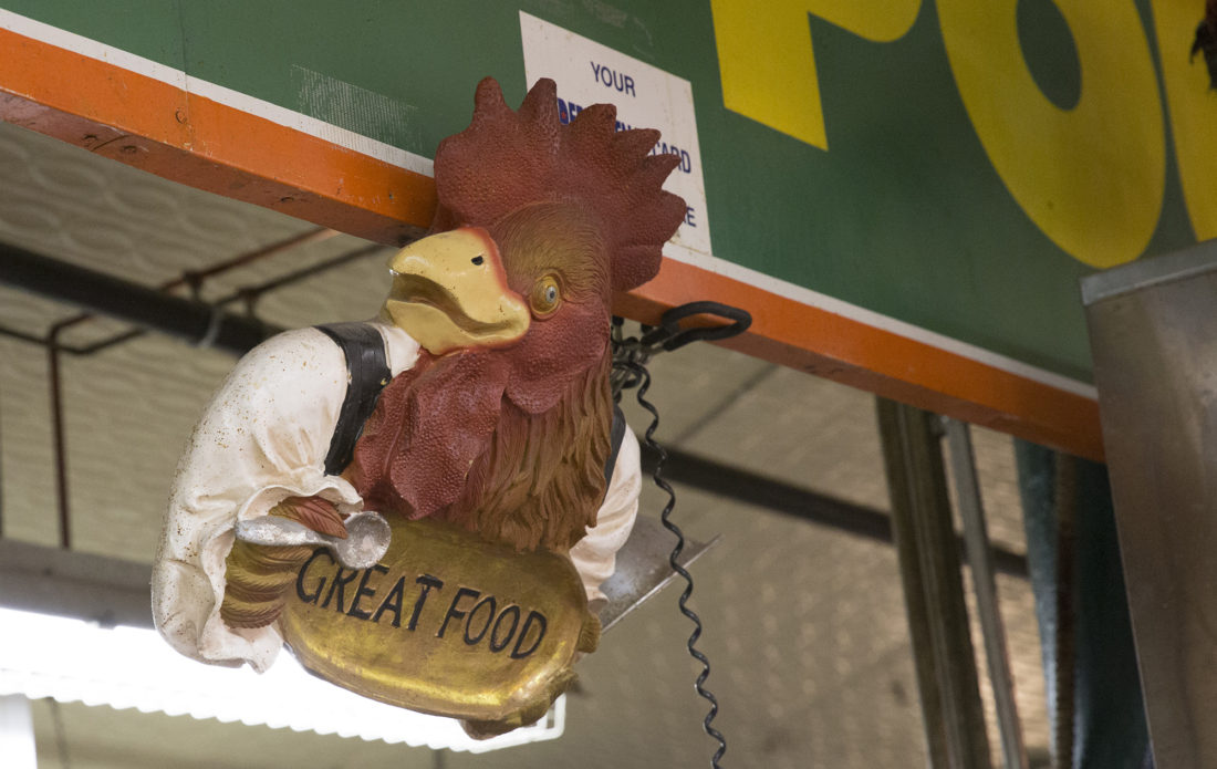 A plastic chicken is displayed on the wall of Jack’s Poultry. David said it was there before he started working at Jack's.