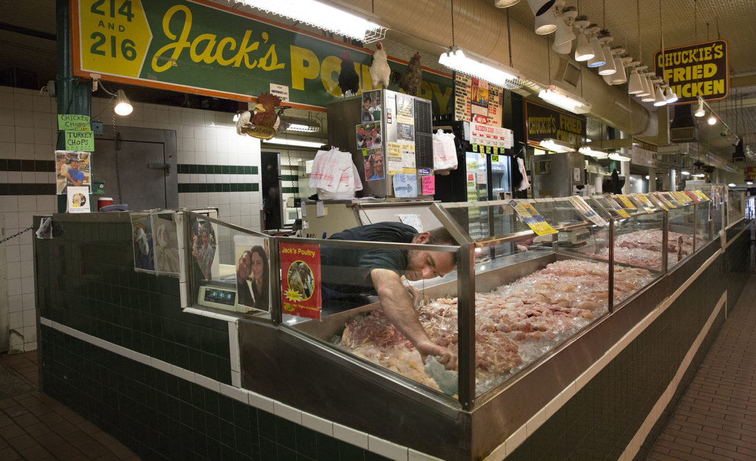 Ben David stocks the display cases at Jack’s Poultry in the Hollins Market, one of six public markets in Baltimore. The market was built in 1829 and Jack’s Poultry has been there for more than 70 years. Ironically, as well known as Jack's Poultry has become, few people realize that none of the family members working there are named “Jack.” David, who is one of the co-owners of Jack’s Poultry, explains the source of the confusion. “My grandfather, Irvin, took the stall from a person named Jack about 70 years ago," David said. "So people have called my grandfather ‘Mr. Jack’ ever since."