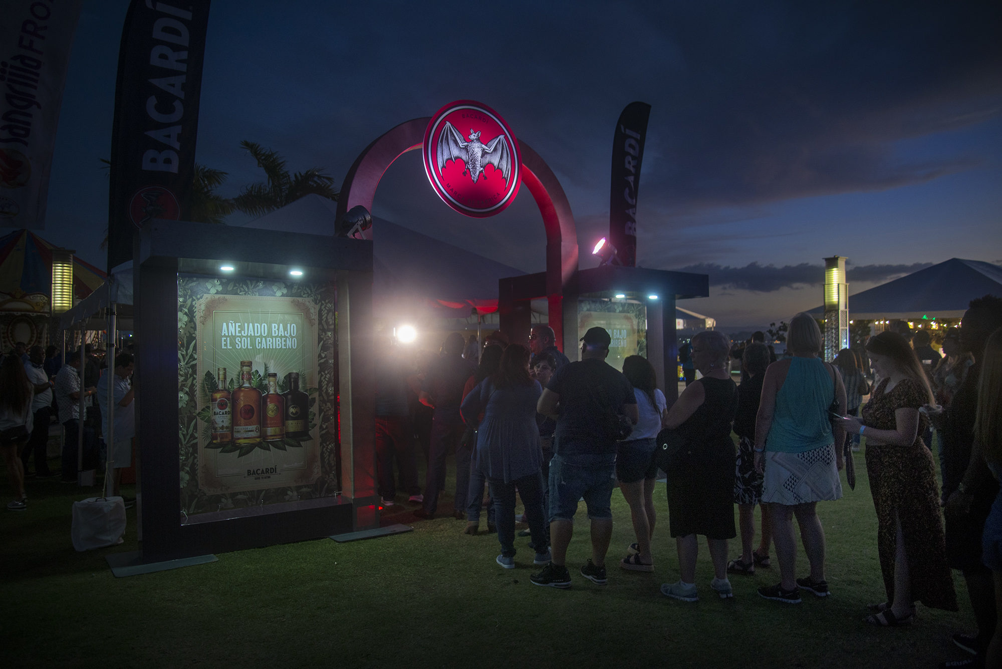 People queue up to enter the Baccardi tent at the Taste of Rum festival.